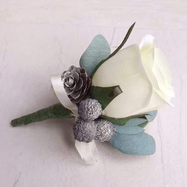 Winter Berry and Pinecone Ivory Rose Buttonhole