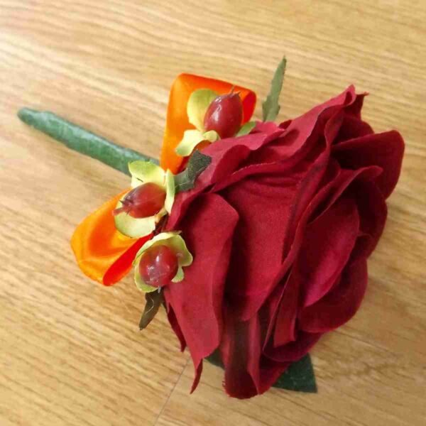 Burgundy Rose Hypericum Buttonhole